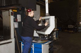 Anna Krogshave Dahlgren controls the CNC machine
