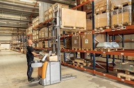 Pallets are lifted down in the logistics center in Hammelev