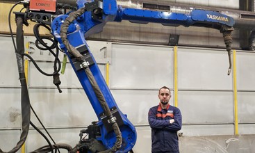 Tadeusz is in charge of a bunch of hardworking welding robots in Poland